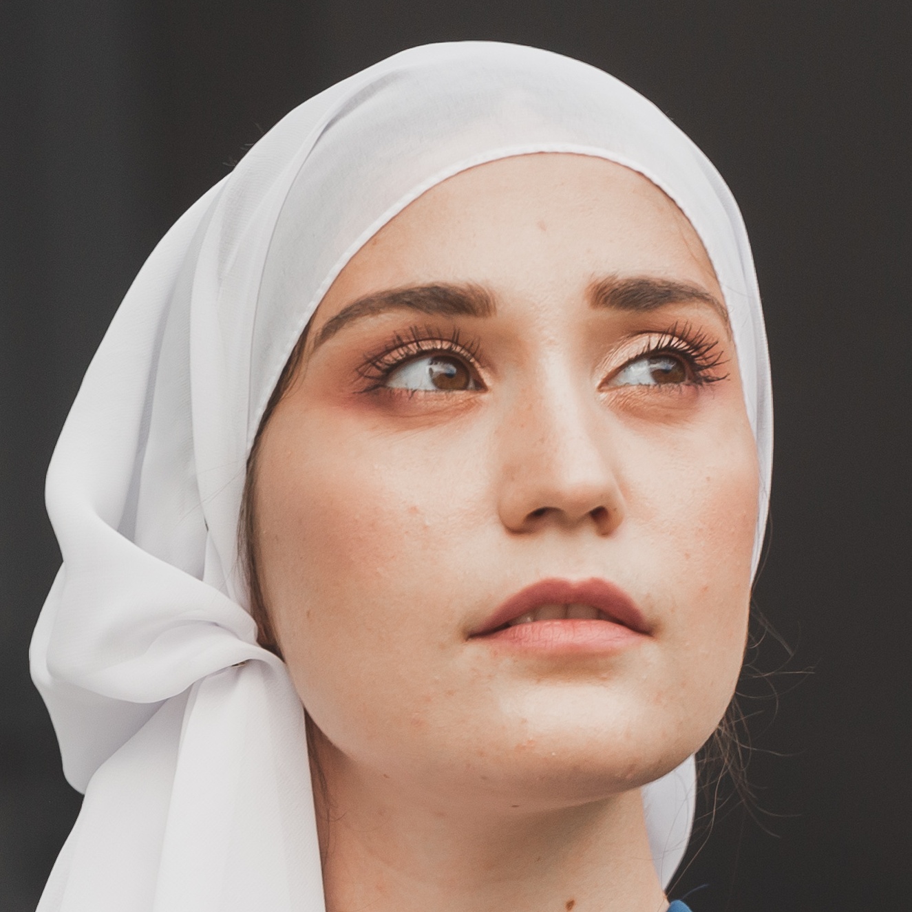 young asian muslim woman portrait in head scarf sm 2021 12 09 17 24 08 utc cropped.jpg